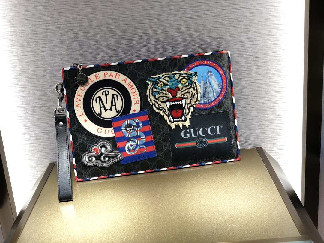 Gucci 拼貼潮流暗色手拿包