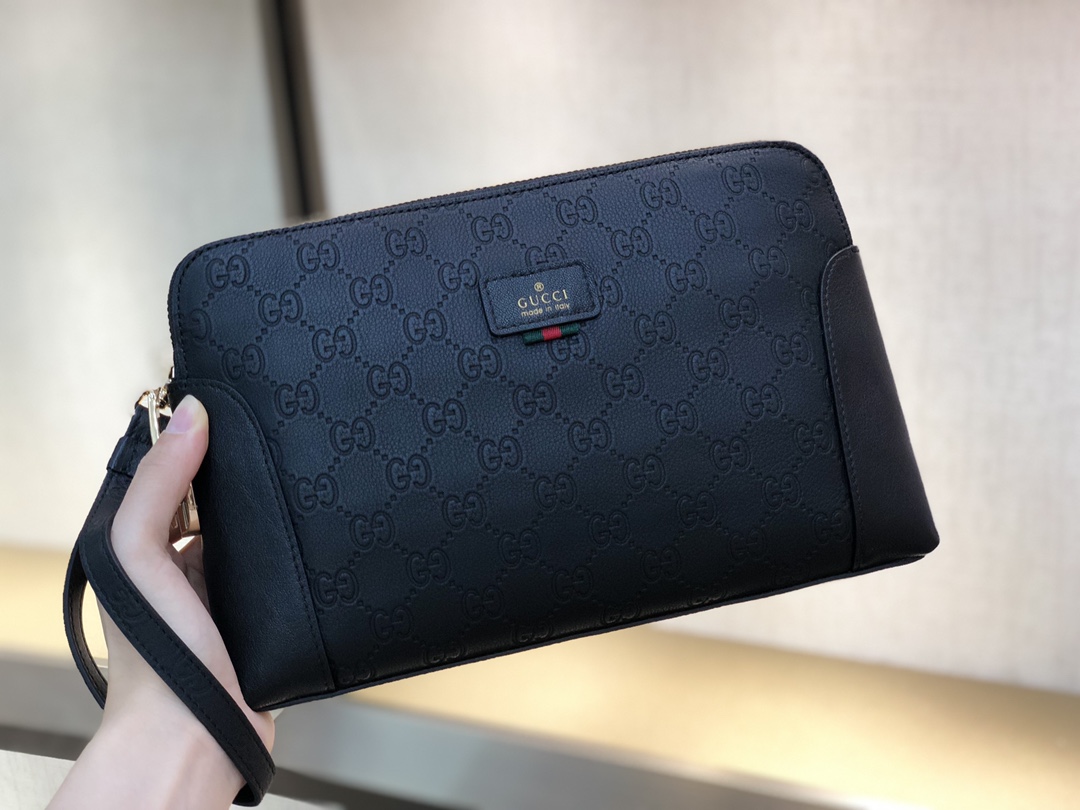 Gucci 壓紋休閒款手拿包