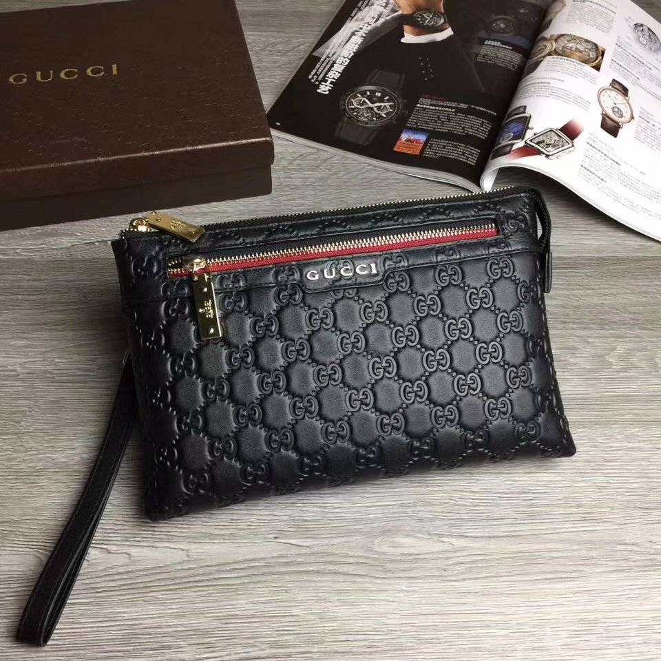 Gucci 浮雕壓花Logo手拿包