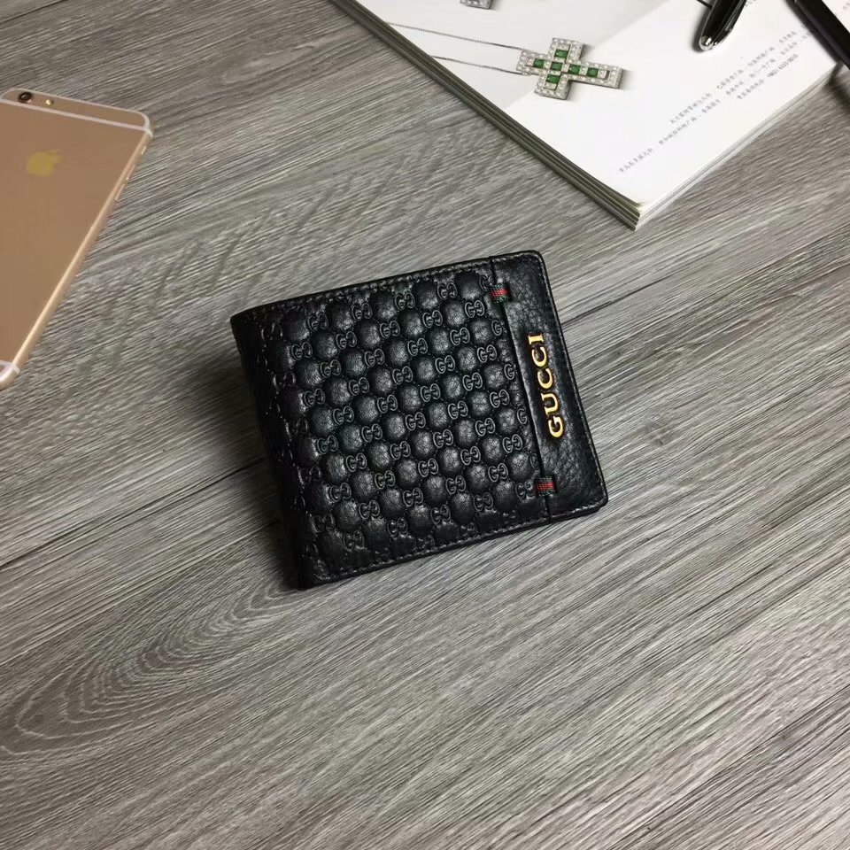 Gucci 滿版壓花小Logo短夾