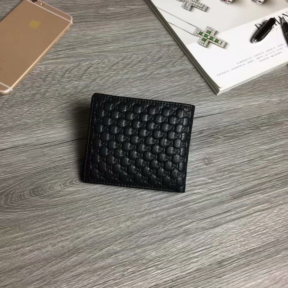 Gucci 滿版壓花小Logo短夾